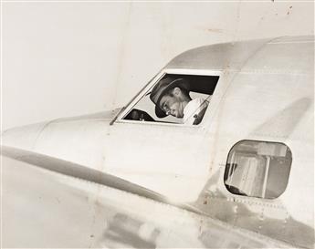 (AVIATION) A selection of 16 photographs documenting the 1930s aviation pursuits of Howard Hughes.